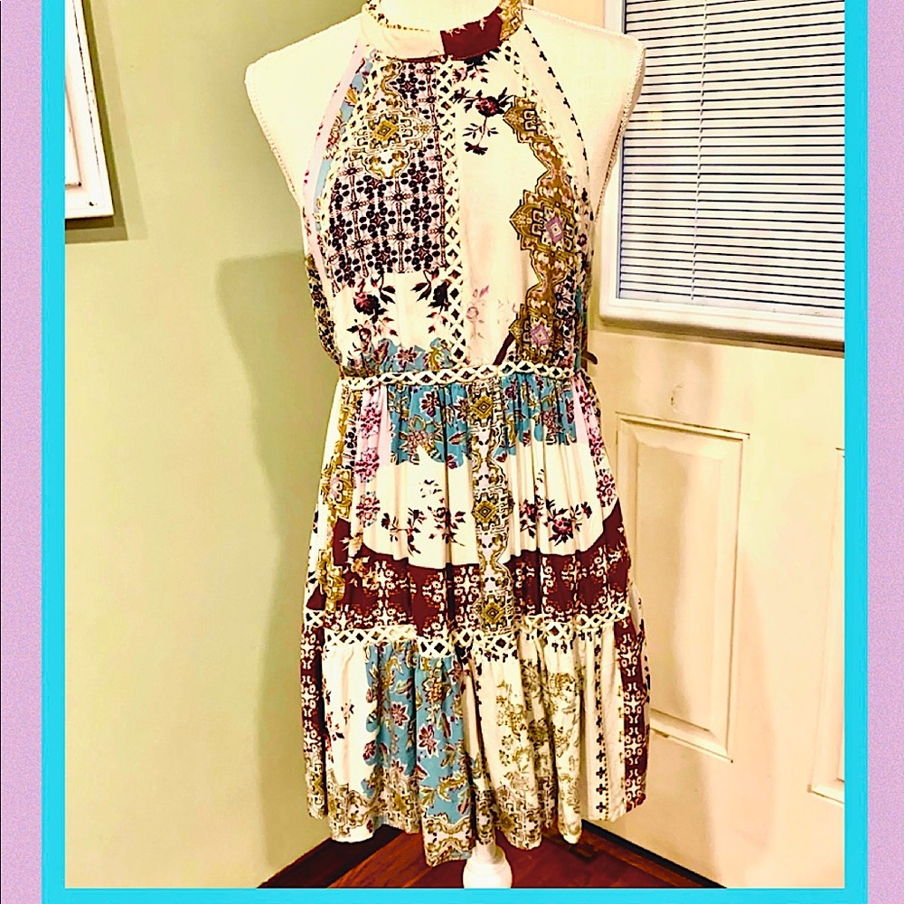 Woman’s backless boho dress.